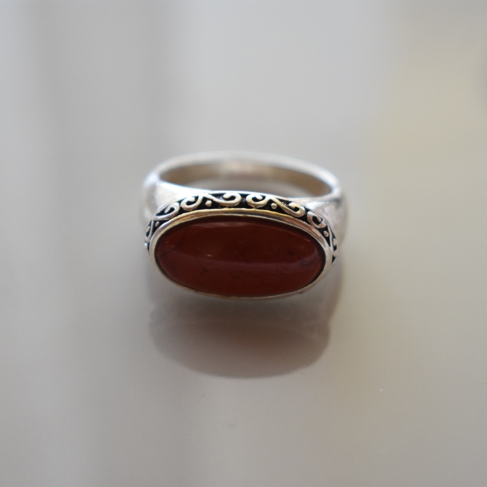 Orange and silver ring